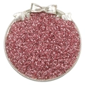 Macro shot of pink silver-lined glass seed beads for DIY jewelry making in a silver tray - Silver Pink