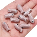Cute light purple ceramic fish-shaped beads for handmade DIY jewelry crafting - 10x19mm (2 Pieces/Pack) / Light Purple