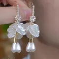 Long gold tassel earrings with white flower petals and waterdrop pearl pendants - E2580 White / 925 Silver Needle