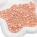 Imitaciones de perlas ABS rosa pulidas en varios tamaños para joyería y artesanía - Naranja