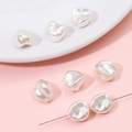 Irregular white baroque faux pearl beads for DIY jewelry making on soft pink background - Straight Hole Starfruit Style (BSG047) / 2 Pcs/Set / Pearl White