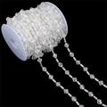 Roll of AB coated faceted acrylic bead chain for DIY wedding decor on black background - Large Bead & Tube Bead (BSD472) / 15m/Roll (Bead: 10x11mm, Tube: 8x3.5mm) / AB Color