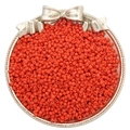 Vibrant orange-red 2-4mm glass seed beads for DIY jewelry making stacked in a silver tray - Orange Red