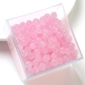 Pink translucent round glass jelly beads for DIY jewelry making in a square storage box - Pink