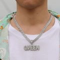 Close-up of iced out silver QUEEN letter pendant and sparkling iced out Cuban chain - Silver Cuban Chain