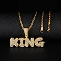 Close-up of gold-plated KING pendant necklace with white rhinestones on rope chain - Pendant Only / Gold