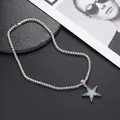 Close-up of star pendant necklace with sparkling blue and white diamonds on tennis chain - Silver Sea Blue Star + 50cm Tennis Chain