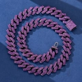 Macro shot of hip hop Cuban link chain with purple pavé crystals on a textured blue surface - 7" / Purple