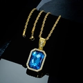 Macro shot of gold pendant with blue rectangular gemstone and small diamonds - Blue Pendant + Rope Chain (Gold)