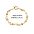 Dettaglio del bracciale a catena con nodi dorati che mostra la chiusura e le dimensioni - Bracciale / Oro
