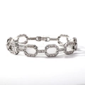Detailed close-up of a silver-toned hip hop cuban chain with clear cubic zirconia stones - Silver Bracelet (0922)