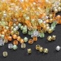 Mix of colorful glass seed beads for DIY jewelry making in various vibrant colors - 10g/Pack Approx 720 Pieces 2.5mm / Warm Orange Yellow Green Mixed