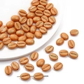 8x10mm acryl koffieboon kralen in parelbrons voor DIY sieraden en telefoonketting maken - Ongeveer 8x10mm Gat 1mm 20 st/Pack / Oranjerood