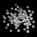 Transparent silicone earring backs disk spacers for jewelry making on black background - 4mm Aperture approx 1.3mm / Clear
