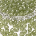 Pale green resin beads with fine silver glitter for DIY jewelry making and bracelets - Green