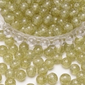 Handmade translucent light green resin round beads with sparkling silver glitter for DIY jewelry - Olive Green