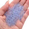 Light blue and lilac frosted glass seed beads for DIY crafts shown in hand palm - Diameter 2-3.5mm 30g/Pack / Blue
