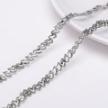 Chaîne géométrique argentée en Z pour bijoux avec bordures de maillons micro-perlées - Fil N° 32 Environ 6 Mm De Large 1 Mètre/sachet
