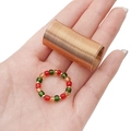 Handmade beaded ring with red and green charms and a golden memory wire spring coil - 0.6mm x 20mm / Gold