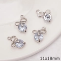 Lot de quatre pendentifs nœuds argentés 11x18mm avec zircon pour création bijoux DIY - Style de Noeud Papillon / 1 Pièce/Paquet (11x18mm) / Argent
