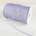 Détail du ruban pailleté violet métallisé sur bobine blanche pour loisirs créatifs - Violet