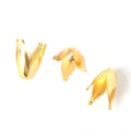 Detailed macro view of three golden flower petal bead caps for DIY jewelry making accessories - Lily of the Valley Shape / 8*13MM (100 Pieces/Pack) / Gold