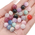 Multi-colored 11x8mm iridescent resin barrel beads on a hand for DIY jewelry - Random Mixed Colors