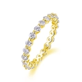 Macro detail of a gold eternity ring with round brilliant cut pavé set gemstones - US Size 5 / Single Ring / Gold