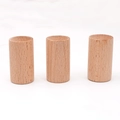 Three cylindrical natural wood essential oil diffusers with smooth top grooves on white background - Beech Wood 4.5x2.5cm