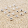 Perles argentées évidées effet poussière d'étoiles pour création de bijoux DIY - Diamètre 4mm, Trou d'environ 0.6mm, 200 Pcs/Paquet / Plaqué Argent