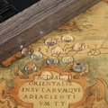 Clear round glass cabochons for DIY jewelry making displayed on a vintage map - Round Diameter 10mm