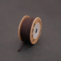 Dark brown waxed cotton cord for DIY jewelry making wound on a wooden spool - Brown