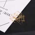 Macro view of bright gold 9-shaped eye pins for DIY jewelry making and beaded earring crafts - 20mm (50g/Pack) / Gold