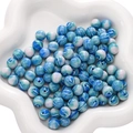 Perles en résine marbrée bleu et blanc sur plateau céramique pour création de bijoux DIY - Blanc Bleu