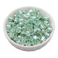 Light green acrylic lily of the valley flower pendants with pearl finish in white ceramic bowl - 8mm / Lily Of The Valley Green