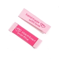 Pink fabric clothing labels featuring handmade with love text and a small heart icon - 50x15mm / Rose Red