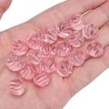 Pink ribbed glass beads in 12mm size for DIY jewelry making held in a palm - Spiral Texture / 12mm (Aperture approx 1.2mm) 5 Pcs/Pack / Transparent Pink