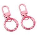 Rosa gepunktete Legierung Donut Federverschluss für DIY Schlüsselanhänger und Taschen - Gesamtlänge ca. 52 mm Schnallengröße 12 x 32 mm Federverschluss-Außendurchmesser 24 mm Dicke ca. 3 mm / 1 Stück / Dunkelrosa