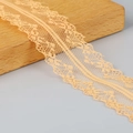 Polyester lace trim with intricate floral pattern in orange color for DIY accessories - Orange