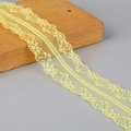 Pale yellow polyester lace ribbon with scalloped edges and floral patterns for DIY crafts - Yellow