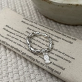 Close-up of S925 sterling silver beaded ring with a star engraved candy charm - Candy Style