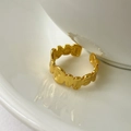 Close-up of S925 sterling silver gold ring with irregular organic wave design - 18k Gold