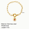 Gold stainless steel paperclip chain bracelet featuring a festive Christmas bell charm - Christmas Bell Pattern (HB0094G17)