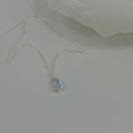 Detail of water drop silver necklace with blue moonstone pendant on white background - 925 Silver / Silver