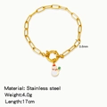 Golden stainless steel chain bracelet featuring a cute snowman charm with red hat detail - Snowman With Green Broom Style (HB0094G26)