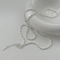 Dettaglio catena ovale in argento 925 con etichetta incisa e catenella di estensione - Argento 925 / Perle di Oliva Argento (55CM)