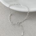 Detailed macro view of S925 sterling silver stamp on the anchor chain link bracelet - 925 Silver / Silver