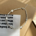 Detalle de la pulsera de plata de ley S925 con cuentas y colgantes de mariposa en 3D - Plata 925 / Plata