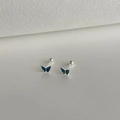 Close-up of blue butterfly 999 sterling silver stud earrings with screw back ball detail - 99 Silver / Silver