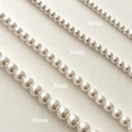 Comparison showing 4mm, 6mm, 8mm, and 10mm white pearl necklace sizes in a close-up view - 925 Silver / 4mm